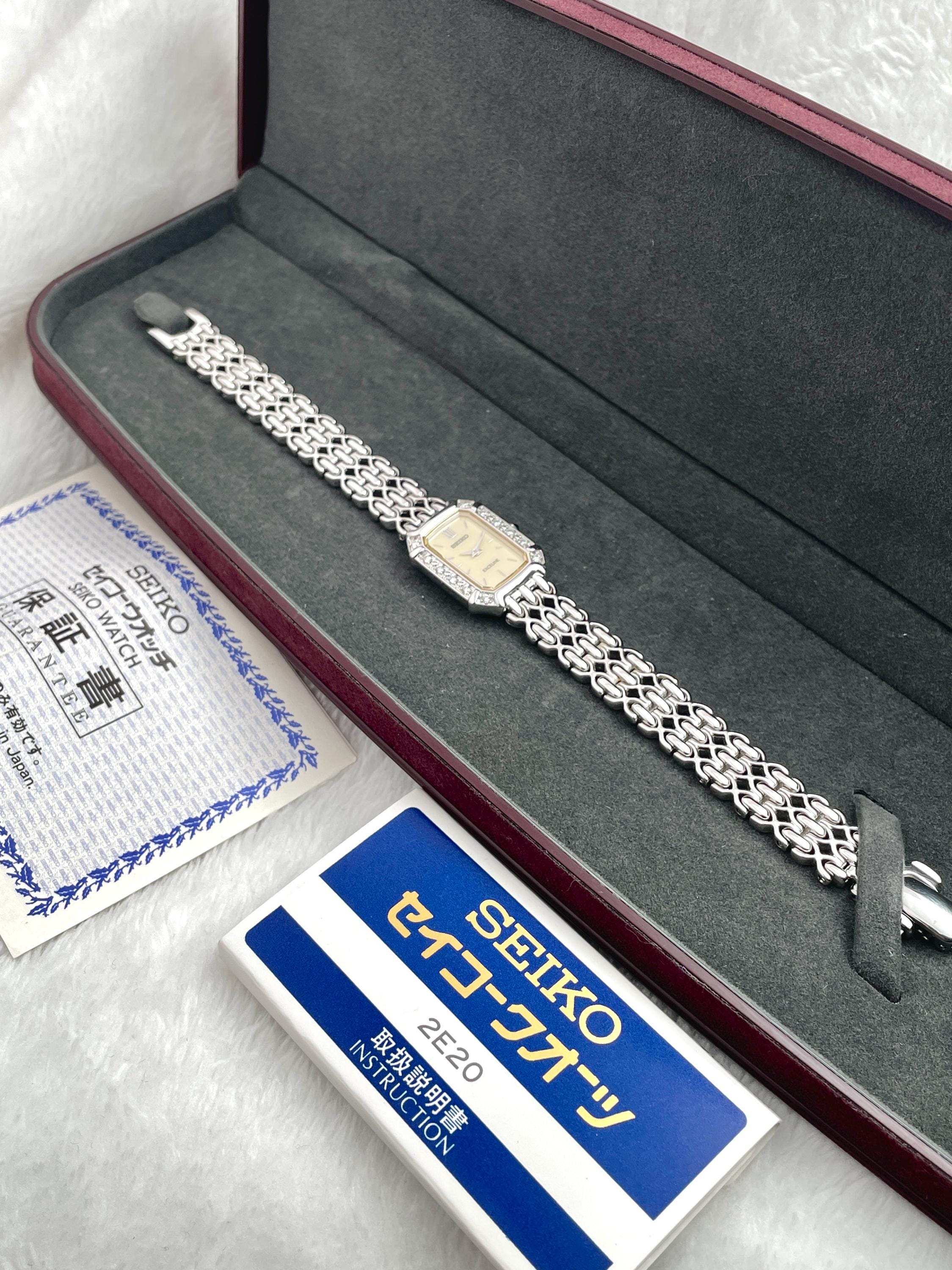 Beautiful Seiko Exceline 12P Diamond Bezel Shell White Bone Dial Square External Engraved Genuine Breath Women Watch 2E20-7460 Quartz