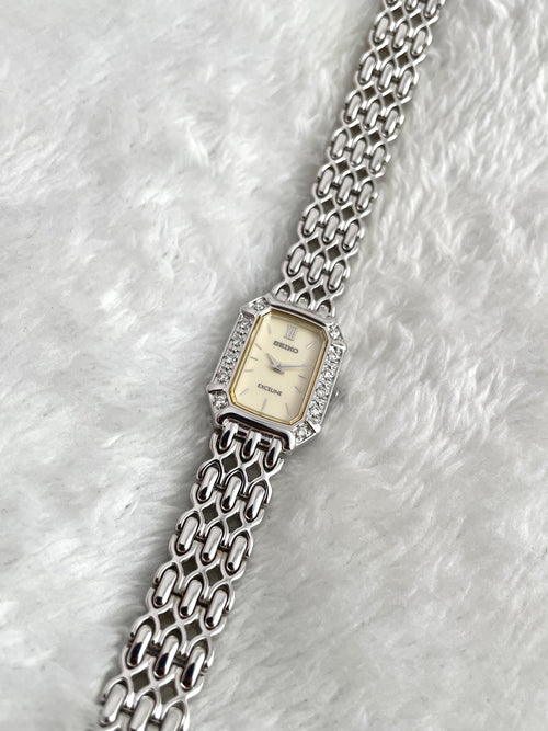 Beautiful Seiko Exceline 12P Diamond Bezel Shell White Bone Dial Square External Engraved Genuine Breath Women Watch 2E20-7460 Quartz