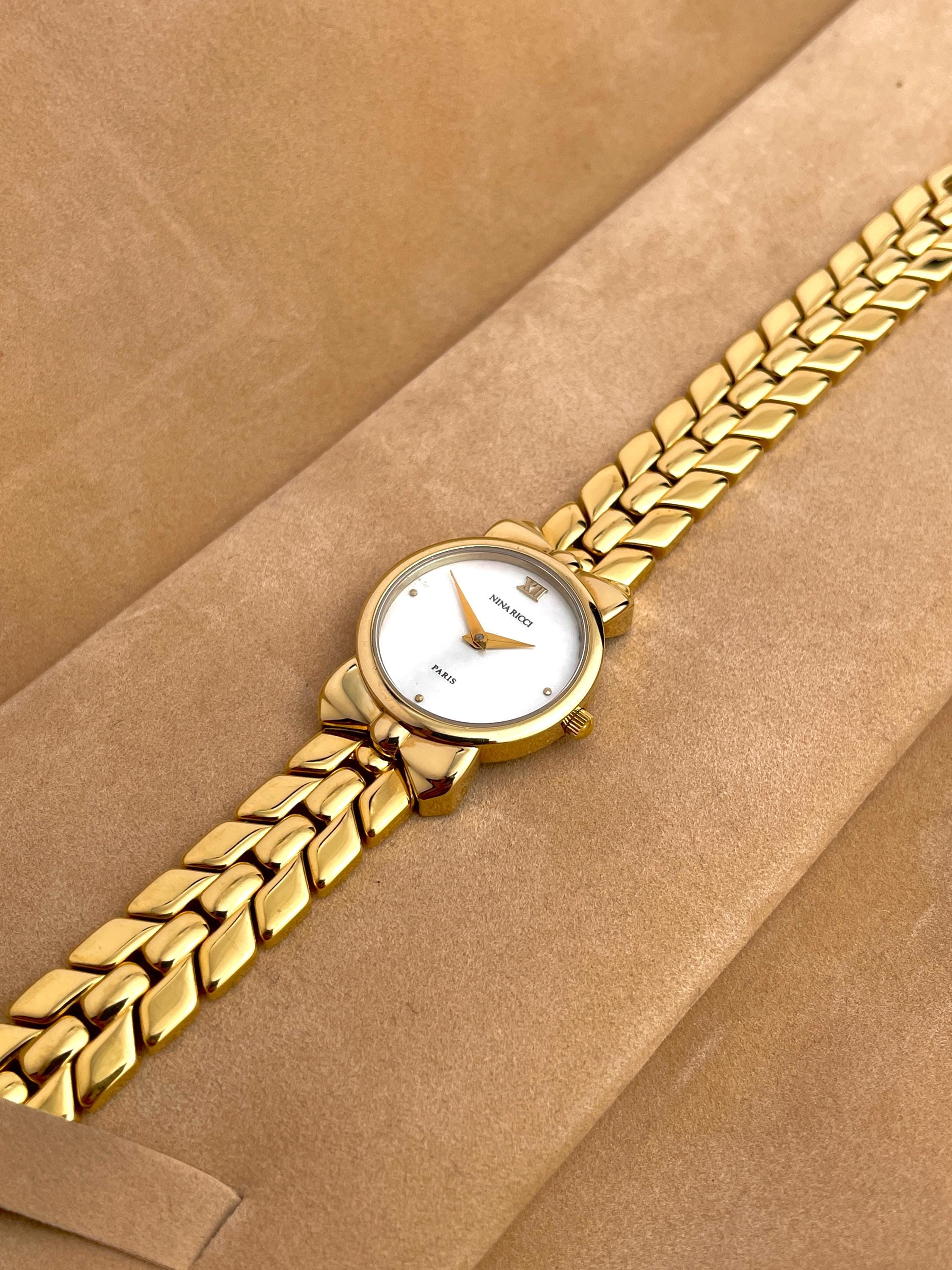 Nina Ricci D954 Gold Tone Ribbon