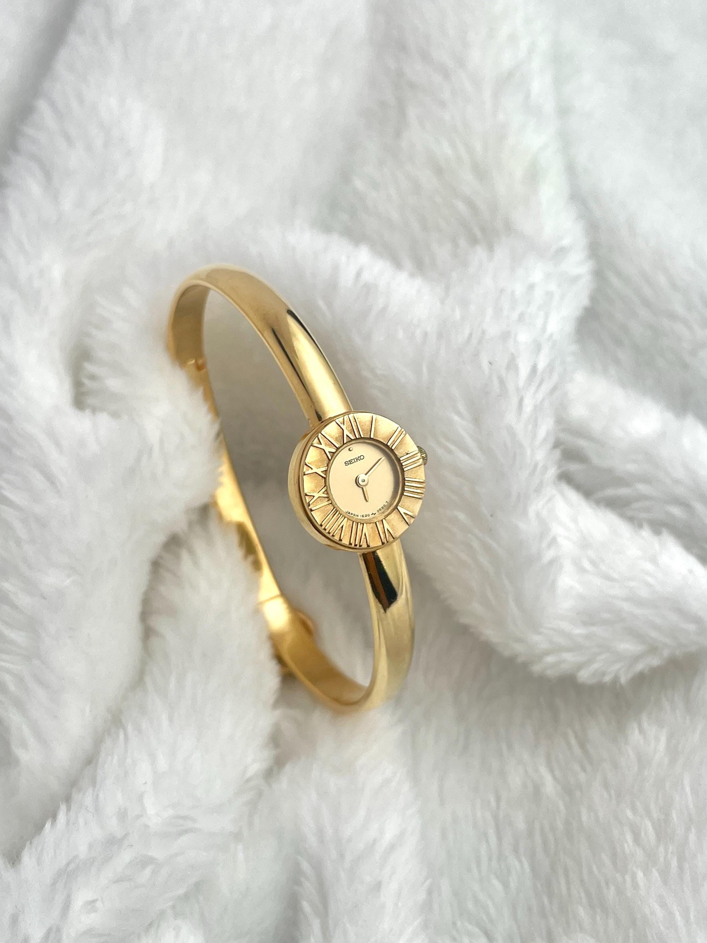 Seiko Bangle Roman Index Gold Tone