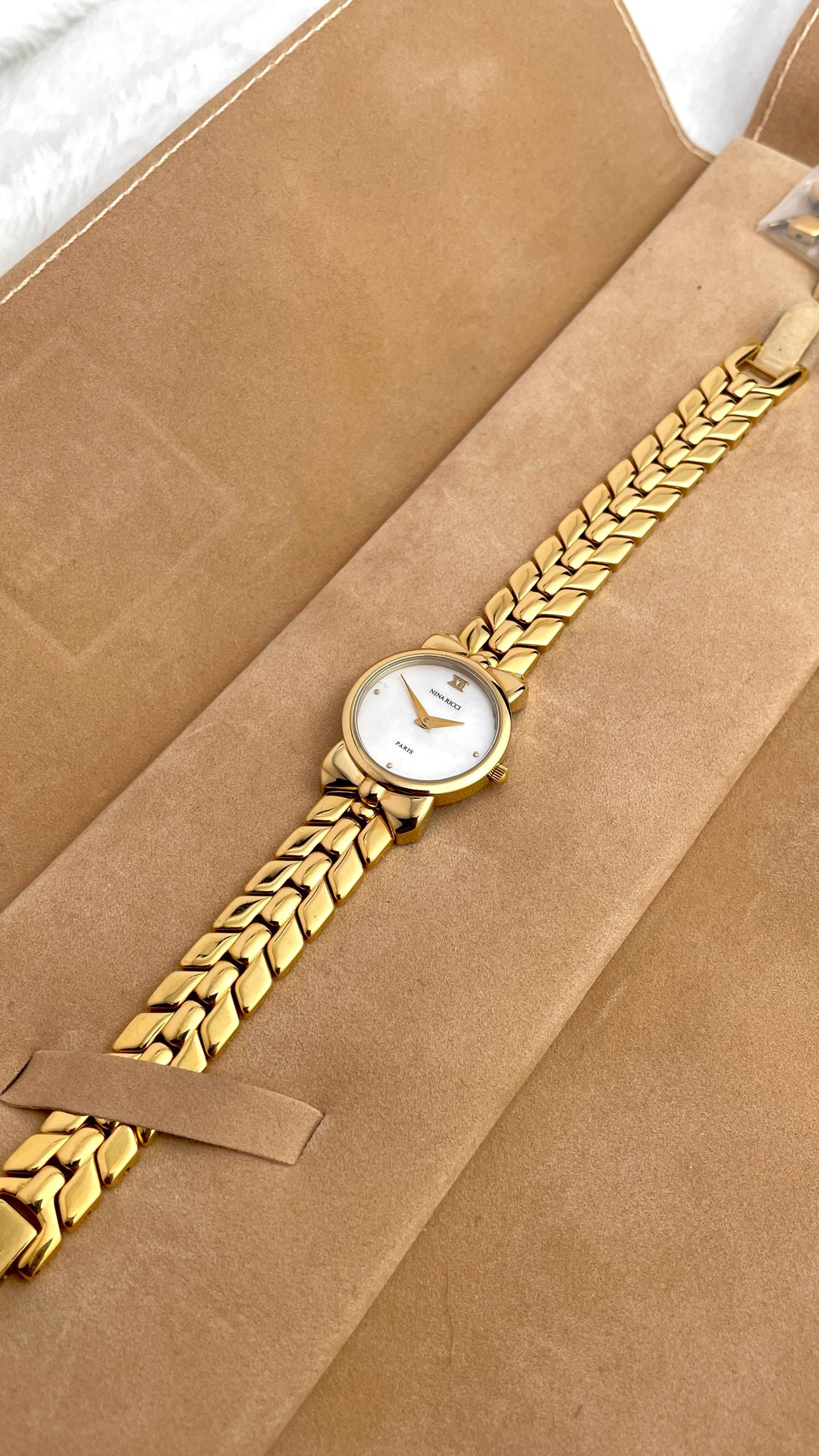 Nina Ricci D954 Gold Tone Ribbon
