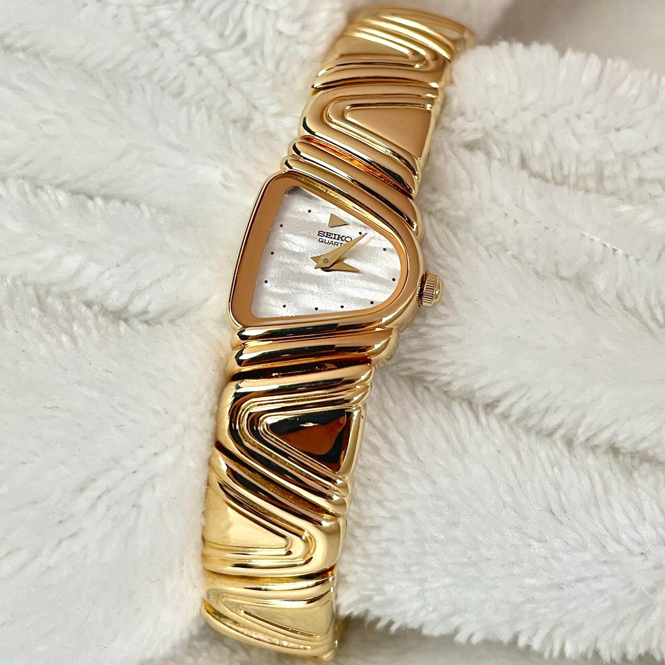 RARE SEIKO Vintage - New Old Stock- 18ct Gold Plated - Half Moon Asymmetrical Piano Face with Mother Of Pearl Dial 4N00-6189