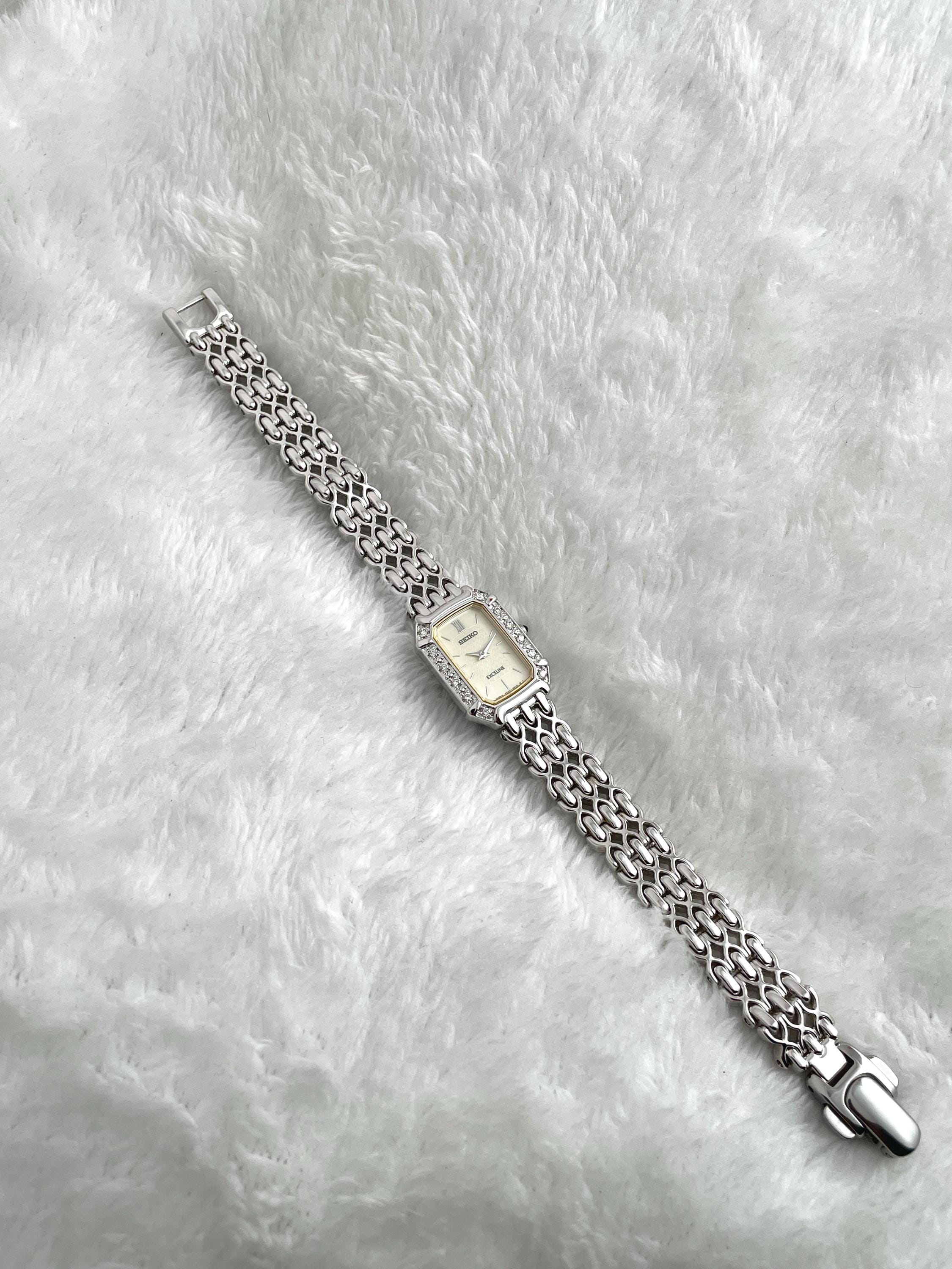 Beautiful Seiko Exceline 12P Diamond Bezel Shell White Bone Dial Square External Engraved Genuine Breath Women Watch 2E20-7460 Quartz
