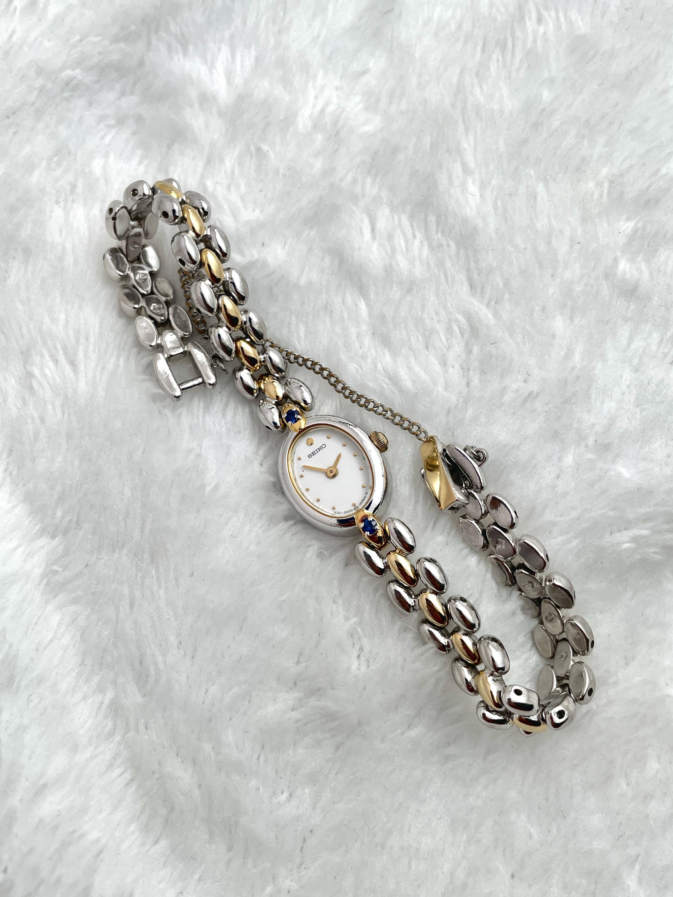 Seiko Ruby Petite Two-tone Blue Gemstone Ladies Watch 1E20-6140