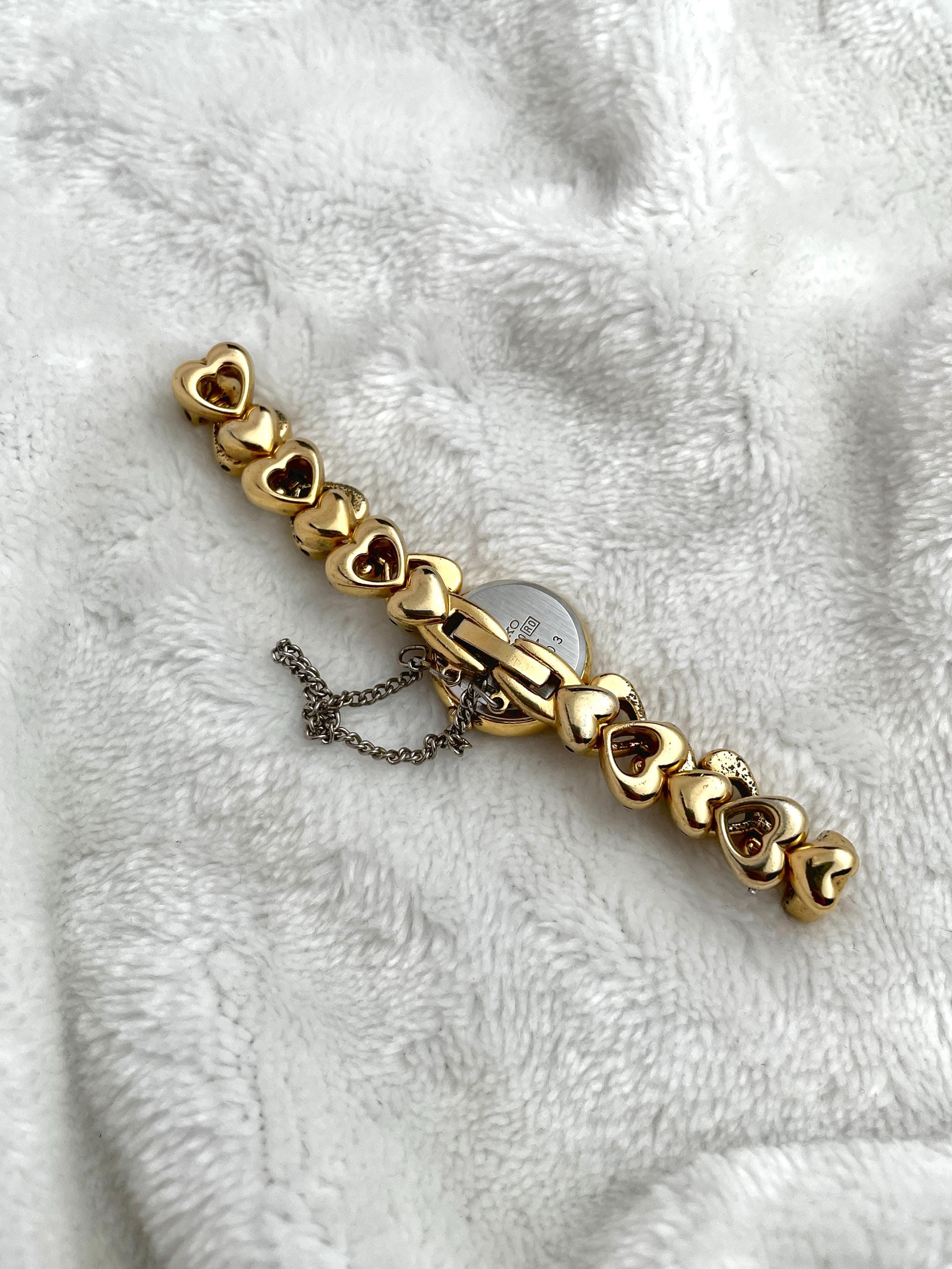 Seiko Gold Tone Heart Bracelet.