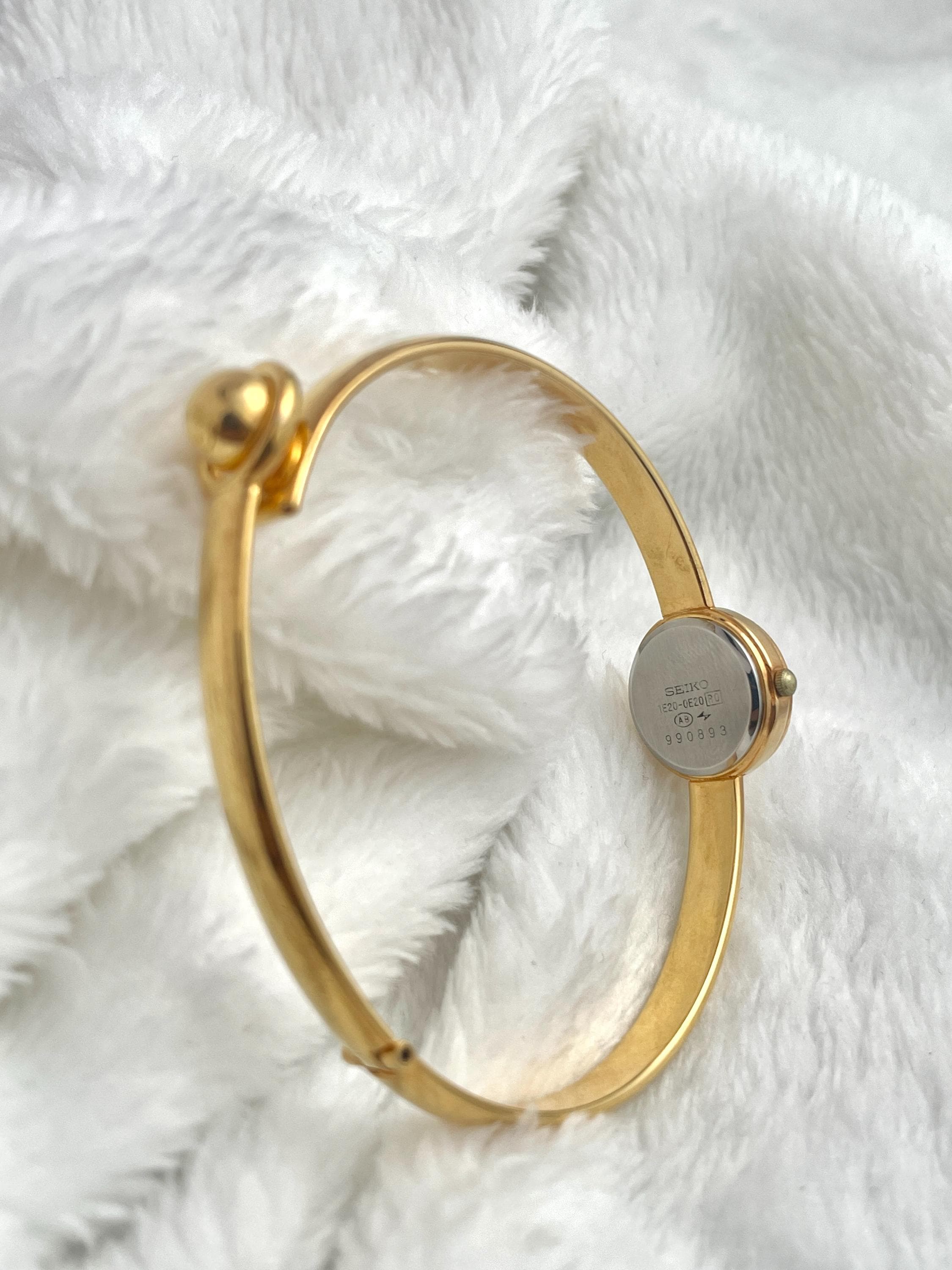 Seiko Bangle Roman Index Gold Tone