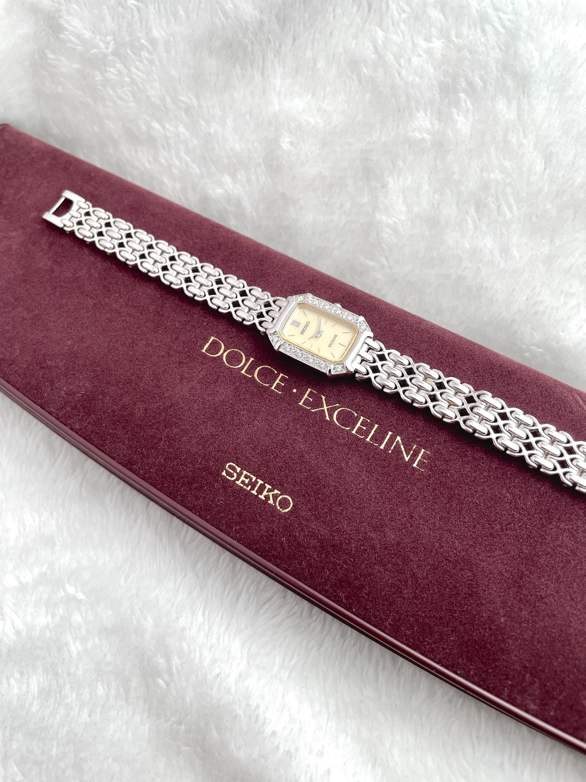 Beautiful Seiko Exceline 12P Diamond Bezel Shell White Bone Dial Square External Engraved Genuine Breath Women Watch 2E20-7460 Quartz