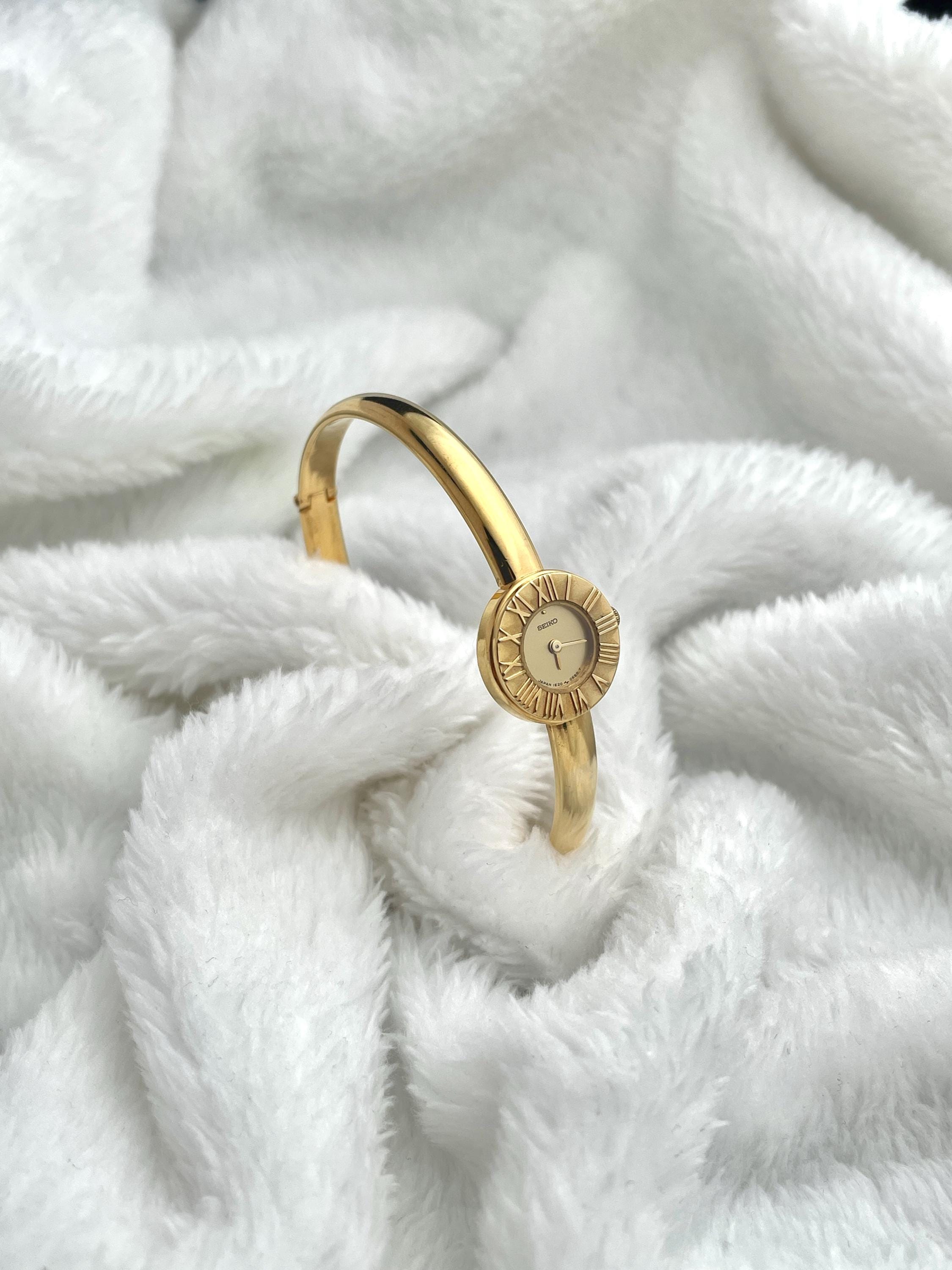 Seiko Bangle Roman Index Gold Tone