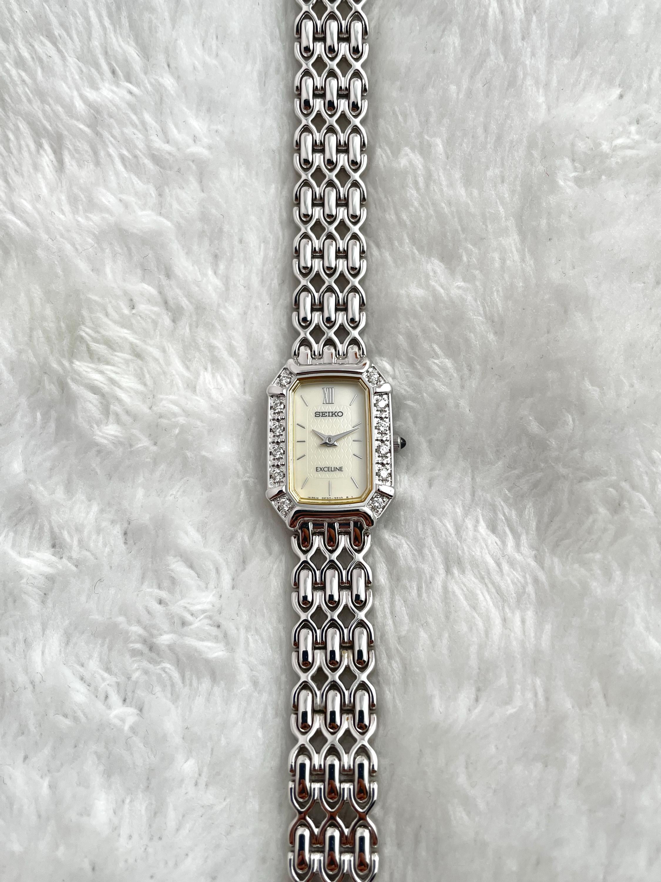 Beautiful Seiko Exceline 12P Diamond Bezel Shell White Bone Dial Square External Engraved Genuine Breath Women Watch 2E20-7460 Quartz