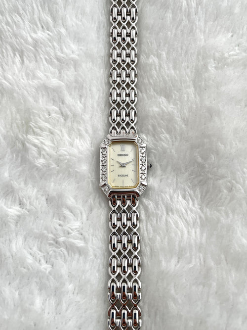 Beautiful Seiko Exceline 12P Diamond Bezel Shell White Bone Dial Square External Engraved Genuine Breath Women Watch 2E20-7460 Quartz