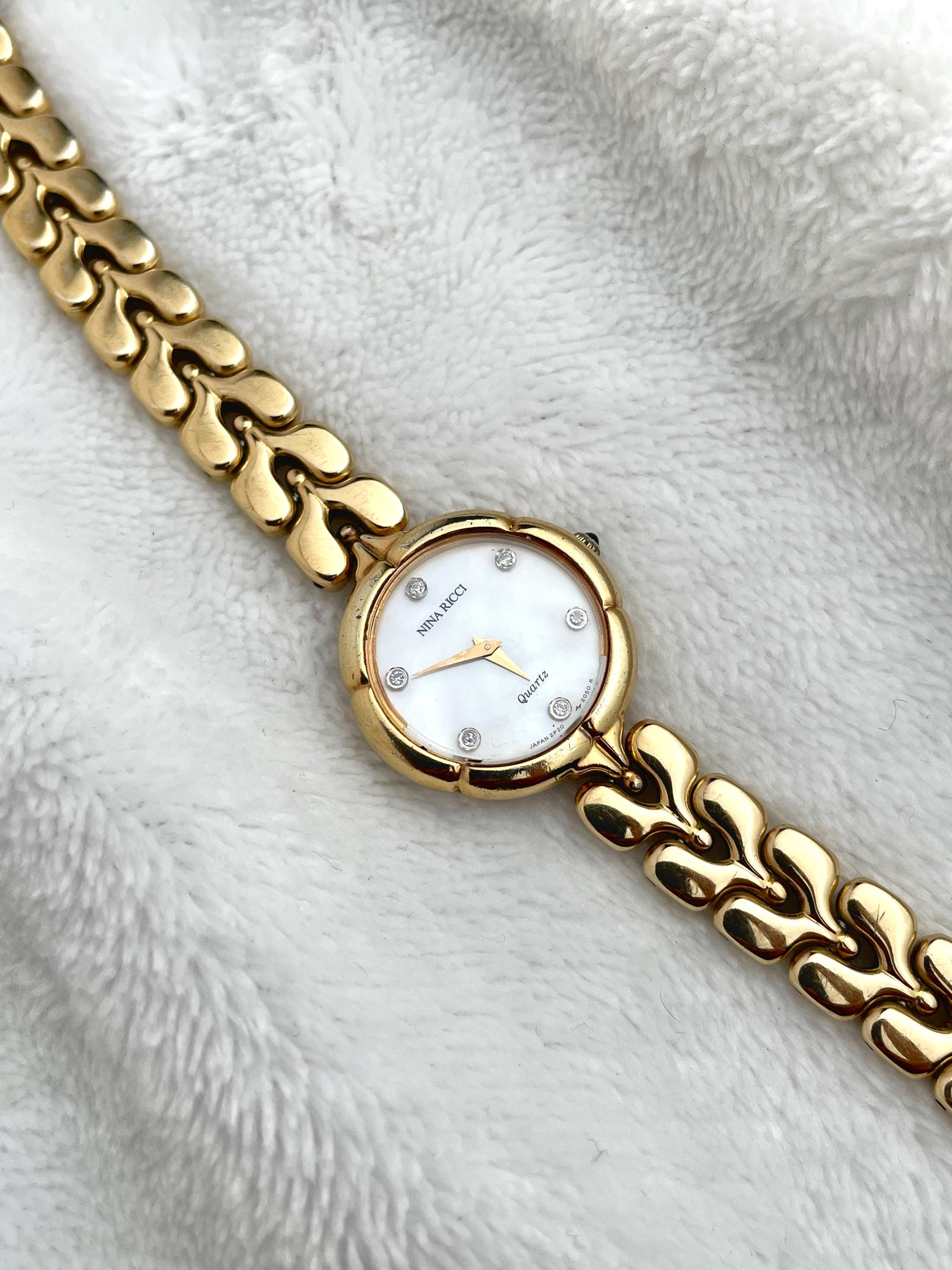 Nina Ricci Dainty Gold Mother of Pearl