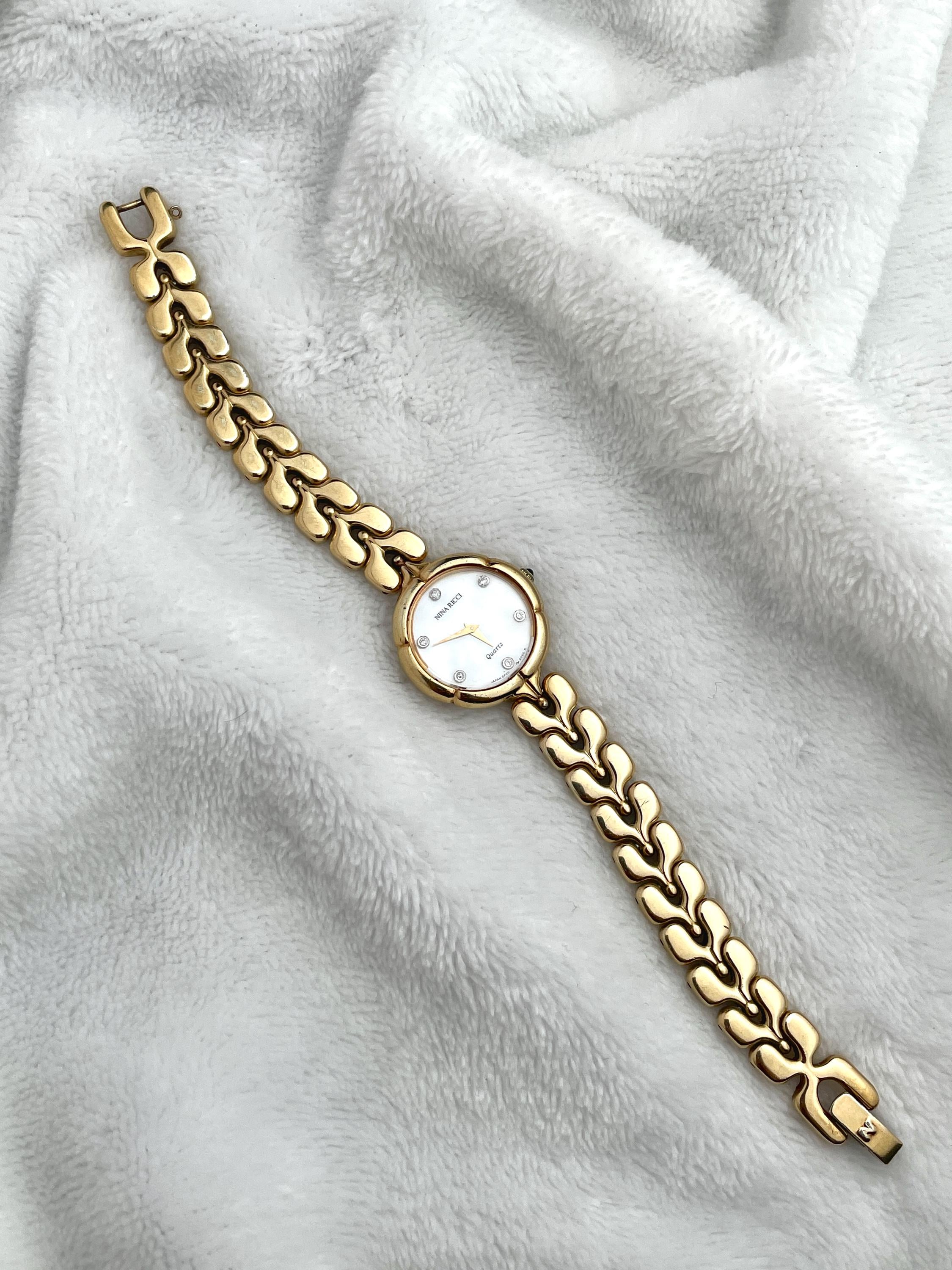 Nina Ricci Dainty Gold Mother of Pearl