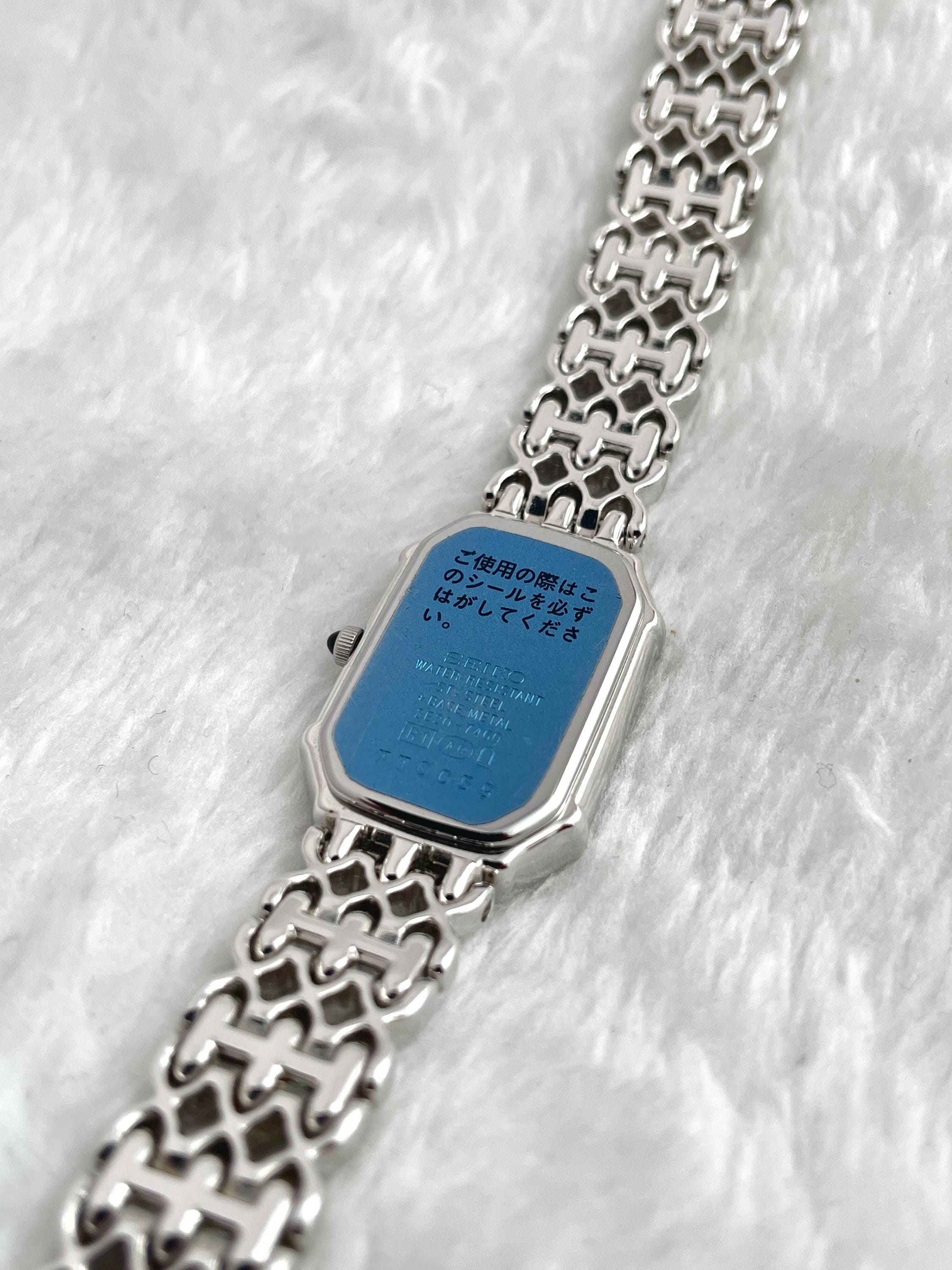 Beautiful Seiko Exceline 12P Diamond Bezel Shell White Bone Dial Square External Engraved Genuine Breath Women Watch 2E20-7460 Quartz