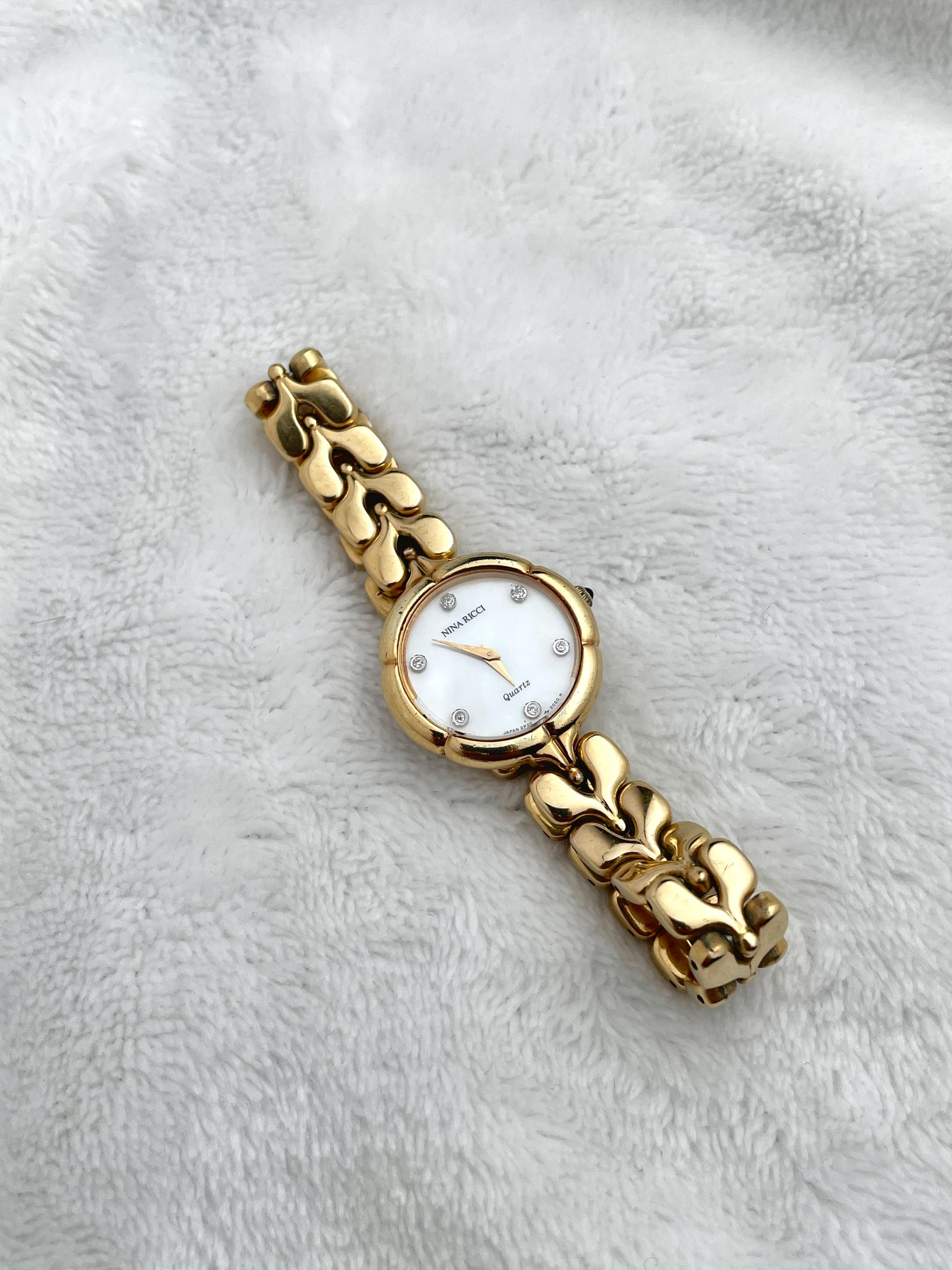 Nina Ricci Dainty Gold Mother of Pearl