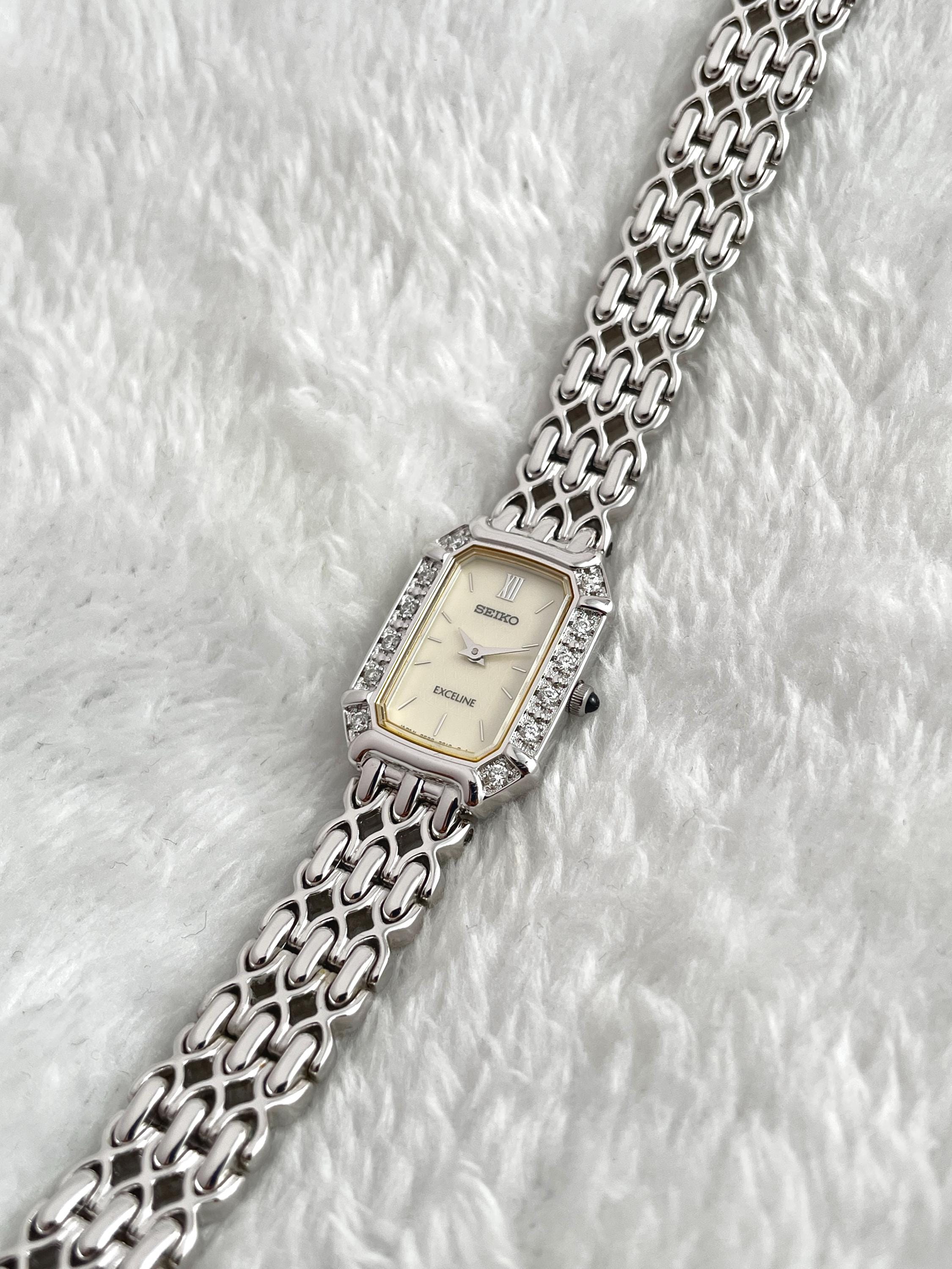 Beautiful Seiko Exceline 12P Diamond Bezel Shell White Bone Dial Square External Engraved Genuine Breath Women Watch 2E20-7460 Quartz