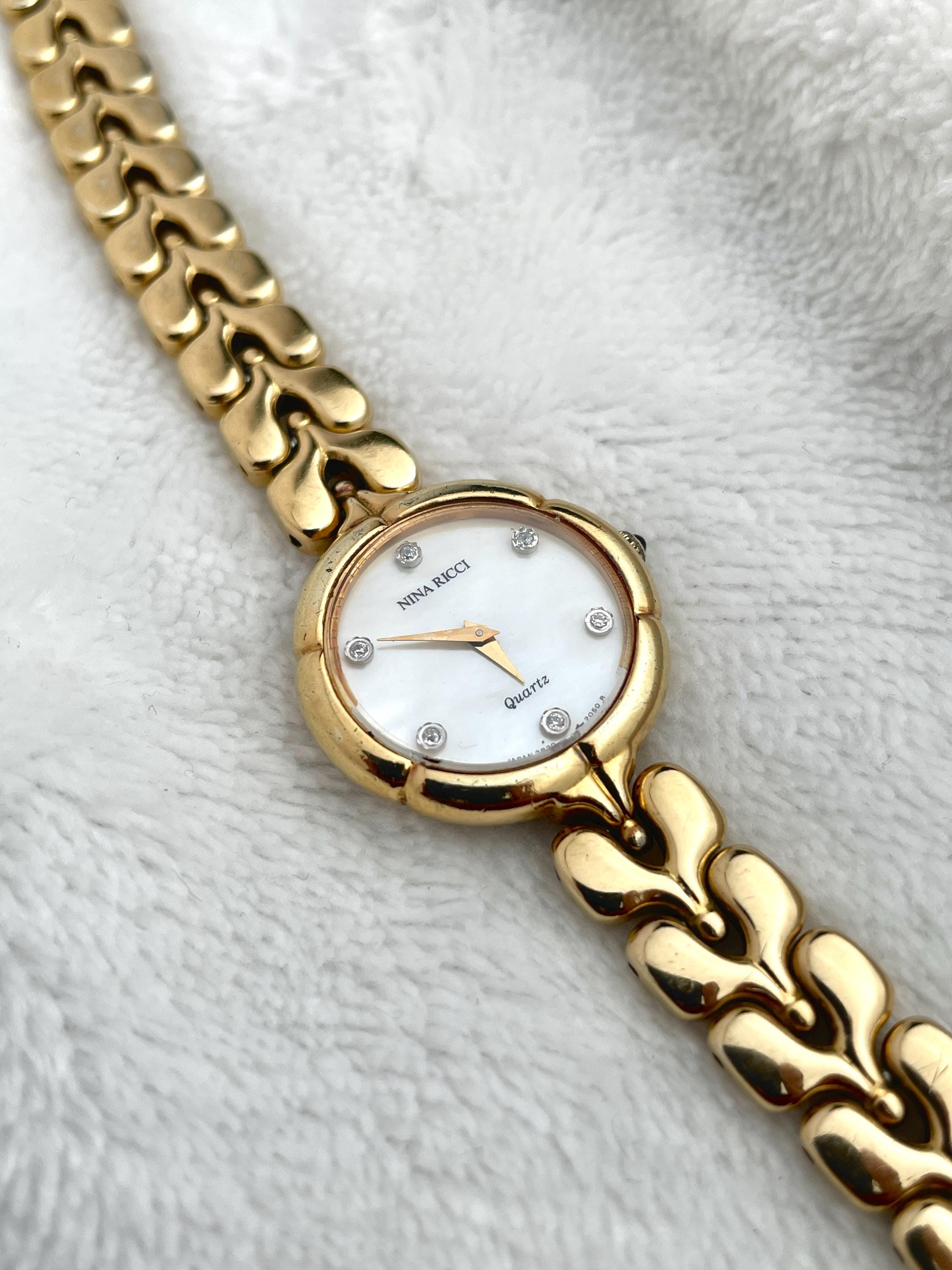 Nina Ricci Dainty Gold Mother of Pearl