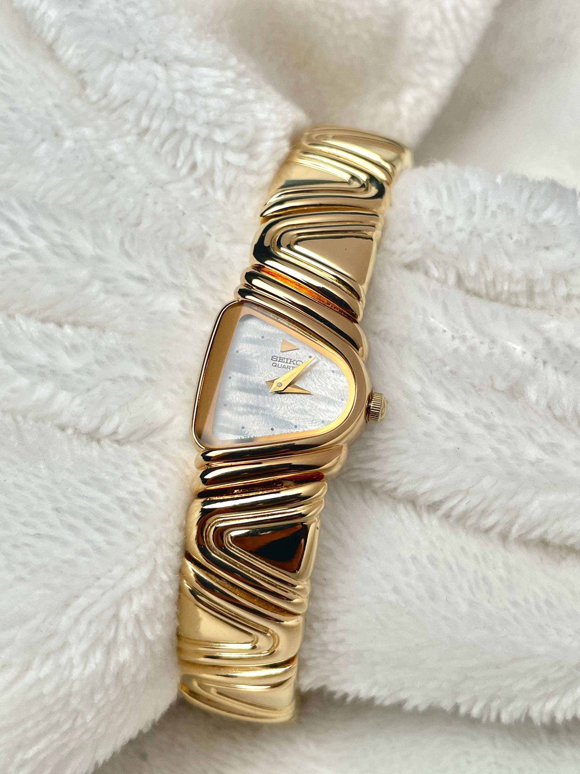 RARE SEIKO Vintage - New Old Stock- 18ct Gold Plated - Half Moon Asymmetrical Piano Face with Mother Of Pearl Dial 4N00-6189