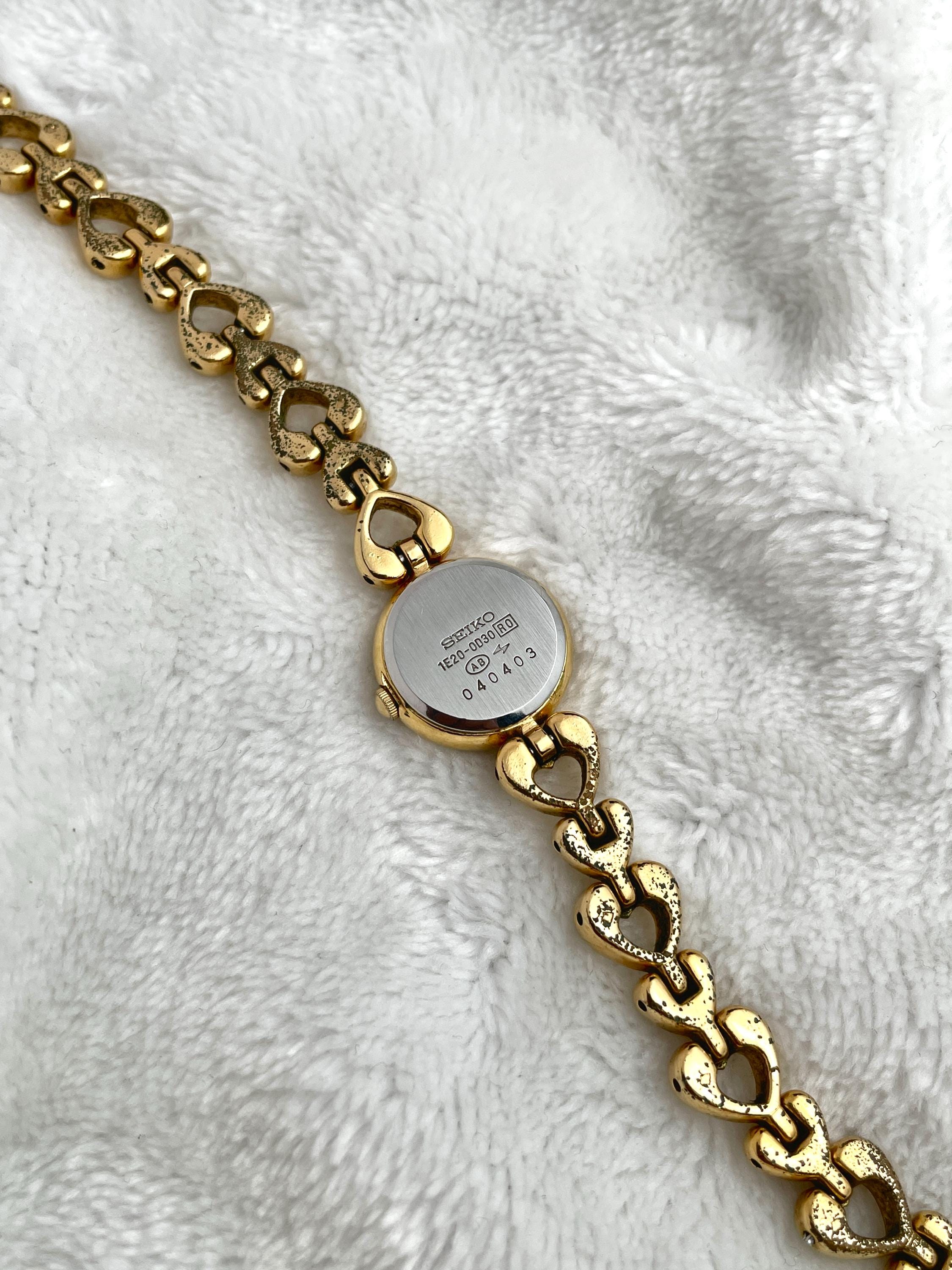 Seiko Gold Tone Heart Bracelet.