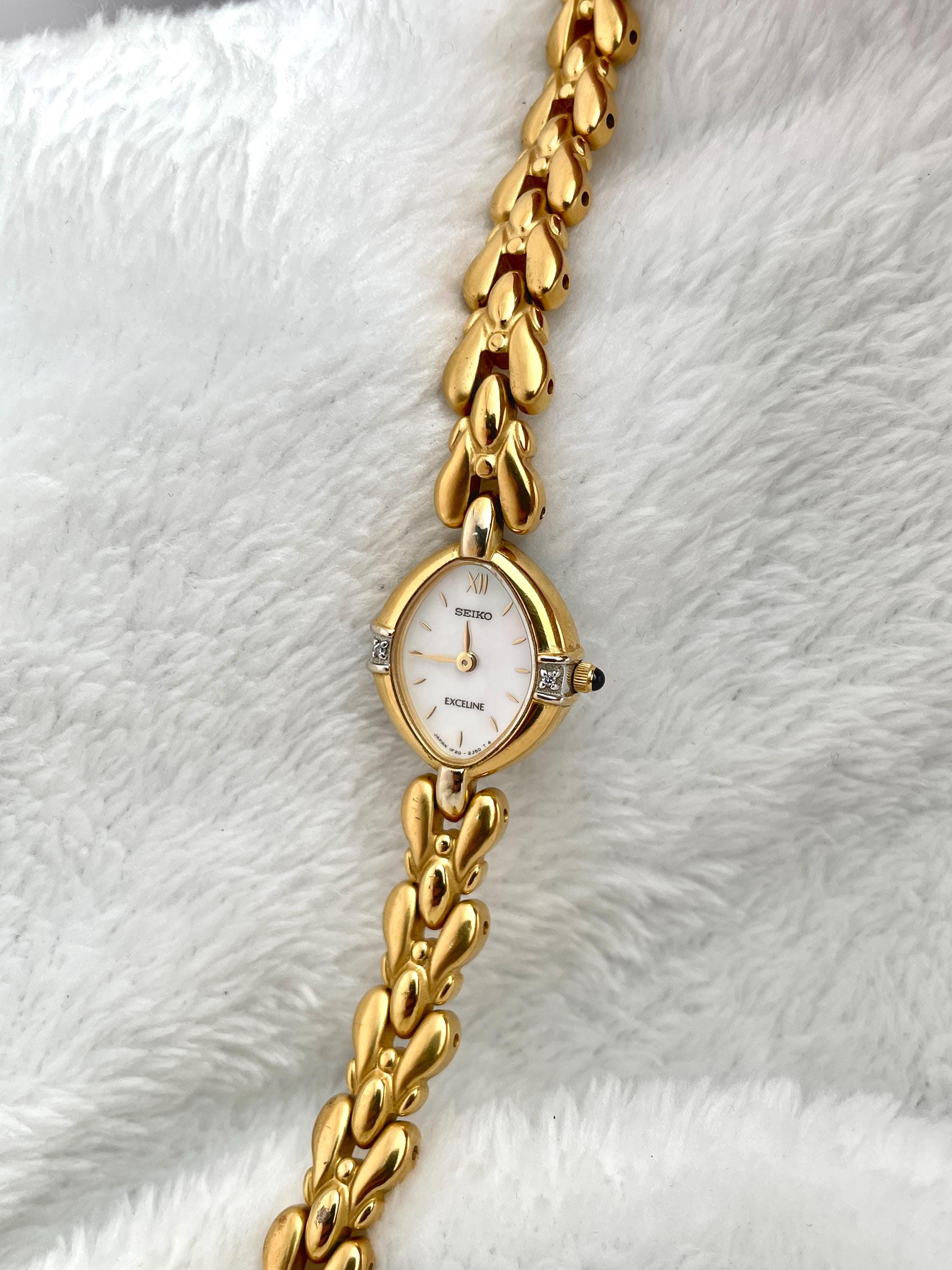 Seiko Ruby Gemstones Dainty Gold Tone