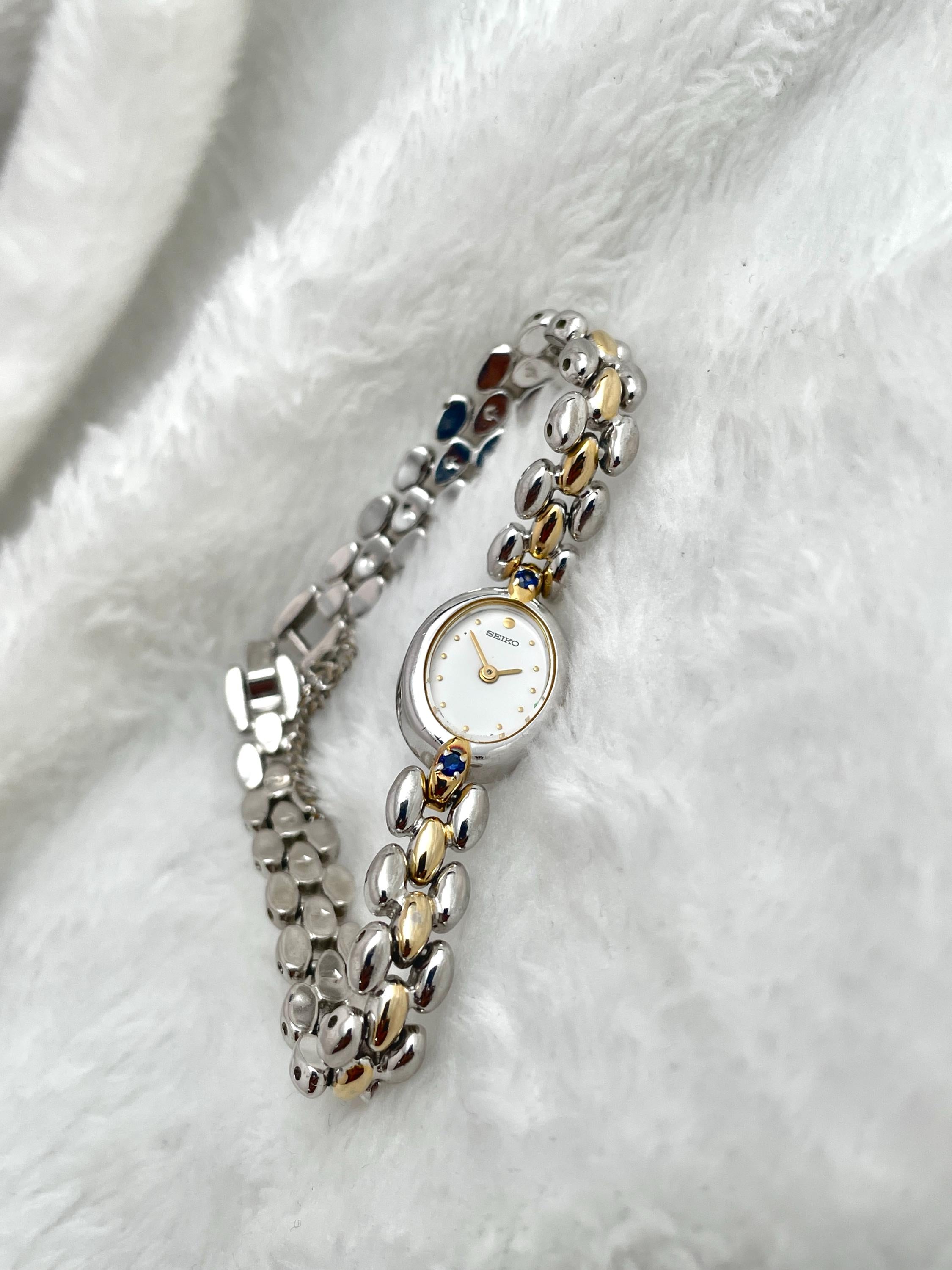 Seiko Ruby Petite Two-tone Blue Gemstone Ladies Watch 1E20-6140