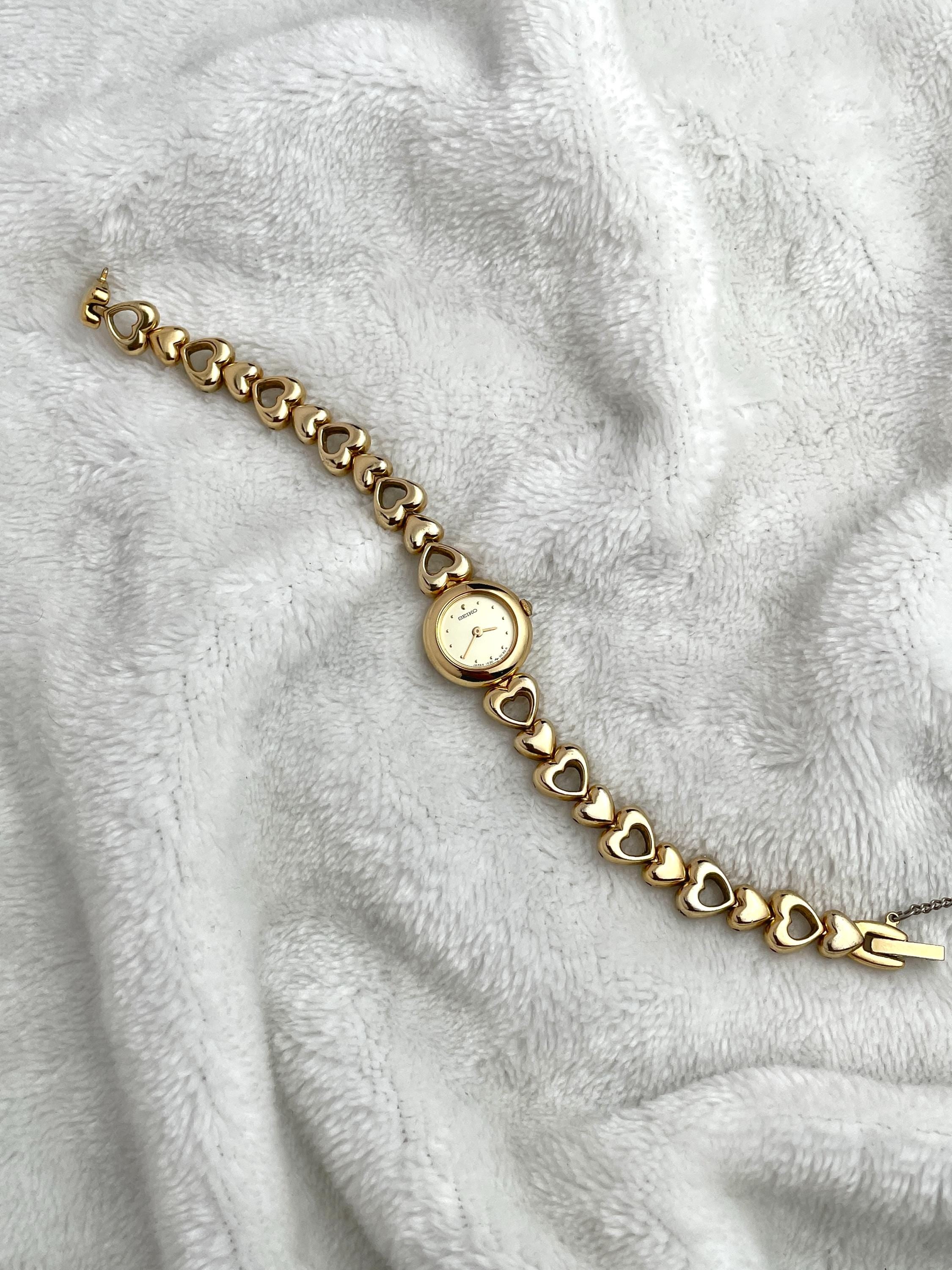 Seiko Gold Tone Heart Bracelet.